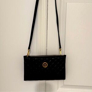 Pre owed Black Versace crossbody in excellent condition.